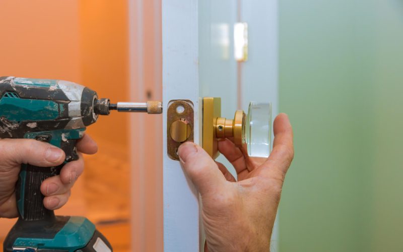 closeup-of-a-professional-locksmith-installing-or-2021-08-29-01-06-56-utc.jpg