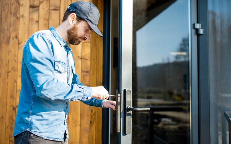 man-repairing-door-lock-2021-09-02-06-24-34-utc.jpg